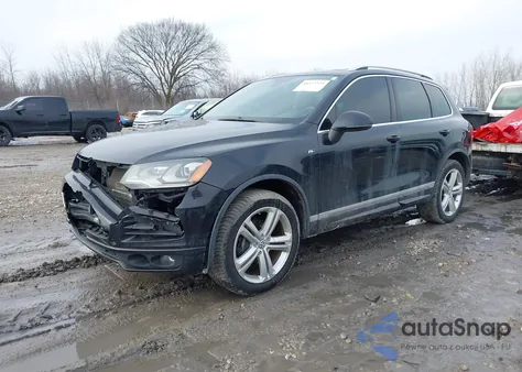 2014 Volkswagen Touareg 3.6L R-Line z USA, uszkodzony, nr VIN WVGDF9BP2ED002584